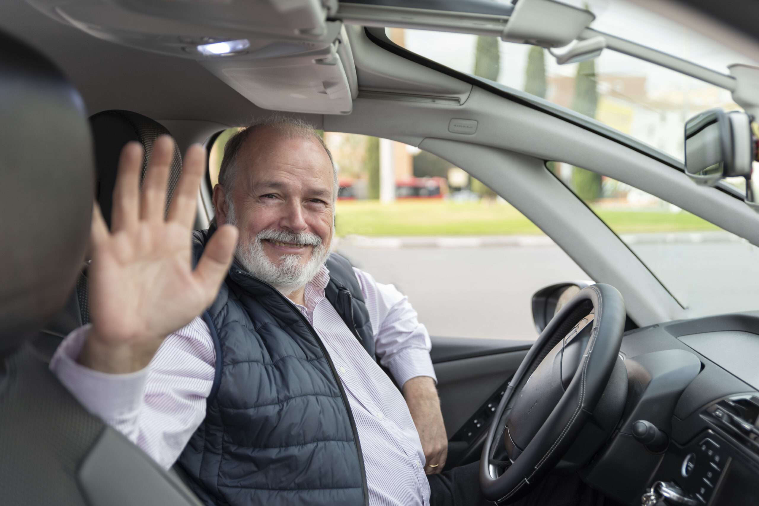 gentleman preparing to trade his car due to the buyback sales event a promotion by willowood ventures