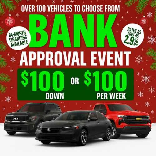a group of cars in front of a red background bank approval event